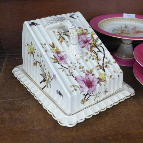 719 - A Royal Doulton pedestal bowl, cheese dish and cover and three pieces of 
Royal Worcester, one stain... 