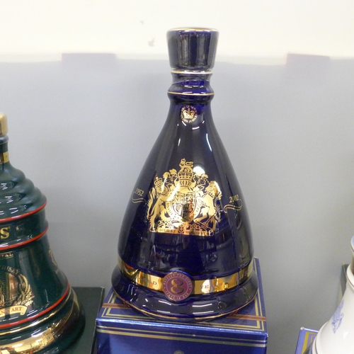 720 - Five Wade Bell's Whisky decanters including Queen Elizabeth The Queen Mother 100th Birthday Christma... 