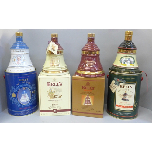 721 - Four Wade Bell's Whisky decanters; three Extra Special and Royal commemorative