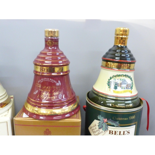 721 - Four Wade Bell's Whisky decanters; three Extra Special and Royal commemorative