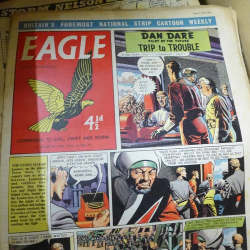 726 - A collection of 1950s and 1960s Eagle comics and an Eagle Passport