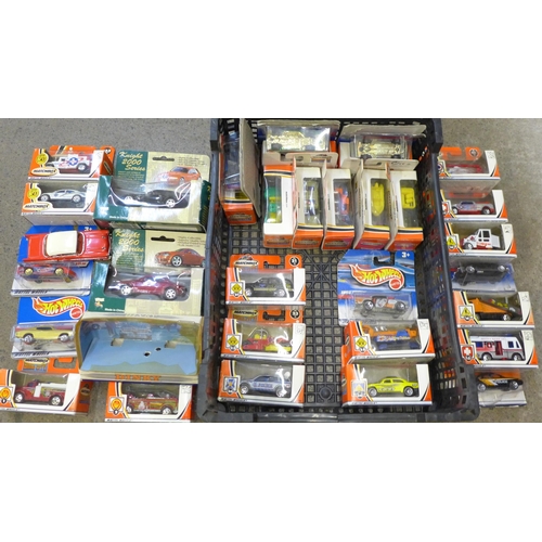 742 - A collection of die-cast model vehicles, boxed