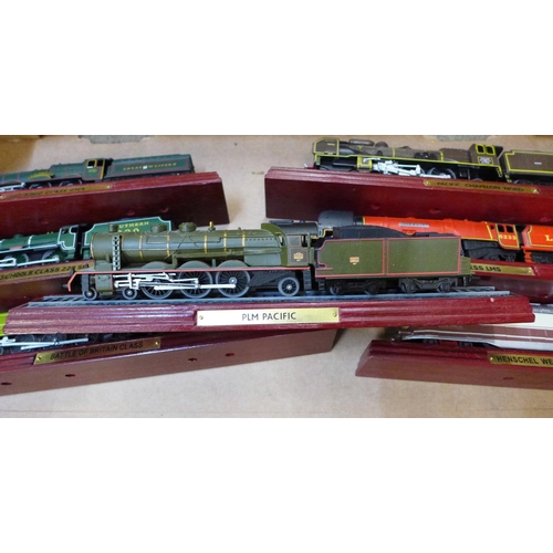 744 - Model railways, a collection of ten Atlas edition model locomotives; Mallard, Battle of Britain Clas... 