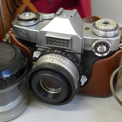 781 - A Zeiss camera, model 207512, in leather case, with pro-Tasser 1:4 f=35 lens, another 36591217 f=115... 