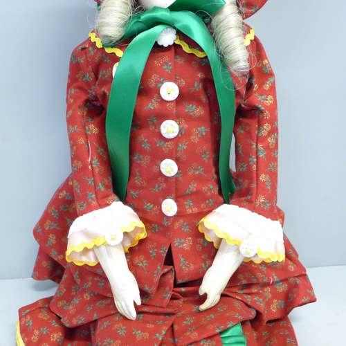 809 - An early German bisque head doll, with kid leather body, believed to be late 19th Century (been in o... 