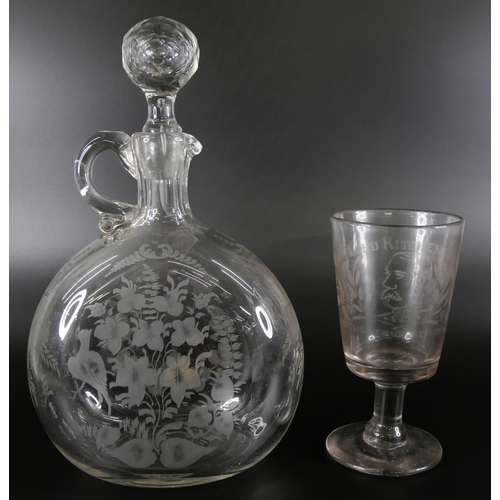 820 - A 19th Century claret jug with engraved design and a circa 1900 glass with Lord Kitchener engraving