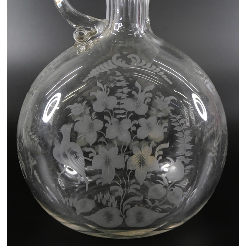 820 - A 19th Century claret jug with engraved design and a circa 1900 glass with Lord Kitchener engraving