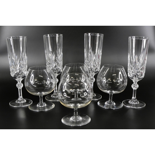 824 - A set of four Baccarat brandy glasses, and a set of four Baccarat champagne flutes