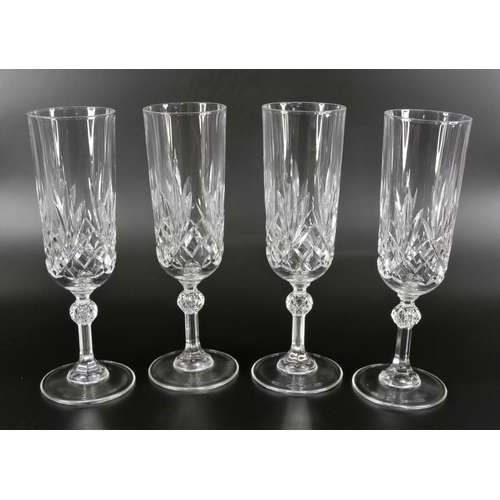 824 - A set of four Baccarat brandy glasses, and a set of four Baccarat champagne flutes