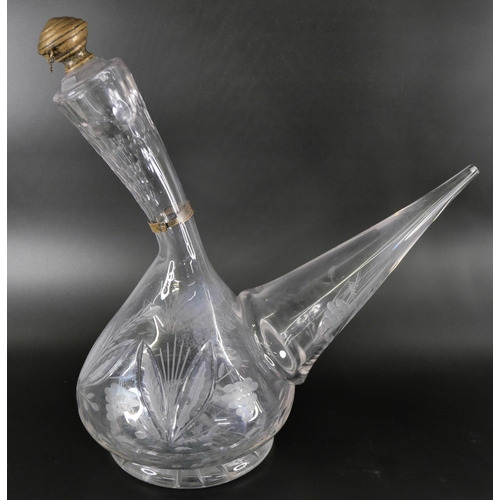 827 - An oversized spirit decanter engraved with flowers and foliage, and a sangria carafe