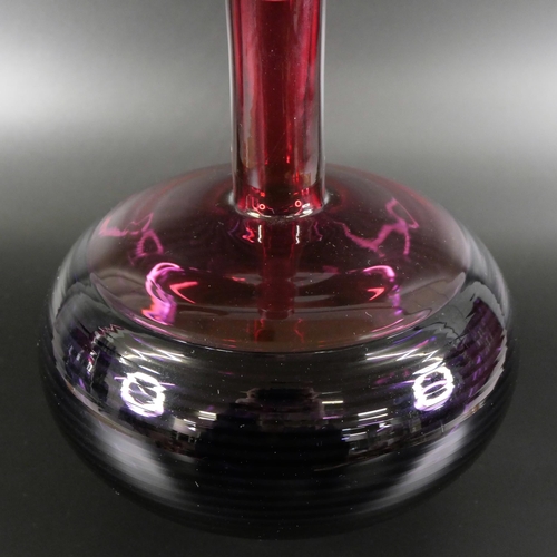 830 - Bob Crooks, a spiral glass decanter in amethyst and ruby, engraved signature to the base, 33cm