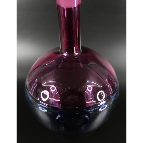 831 - Bob Crooks, a spiral glass decanter in pale blue and cranberry, engraved signature to the base, 36cm