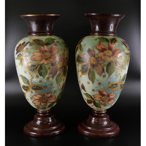 850 - A pair of opaline glass vases, 36.5cm, and a lidded vase