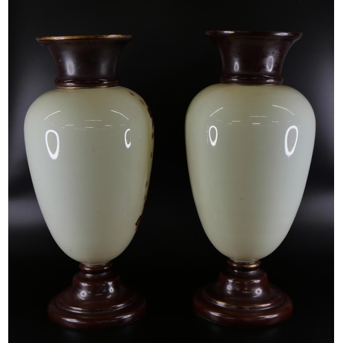 850 - A pair of opaline glass vases, 36.5cm, and a lidded vase