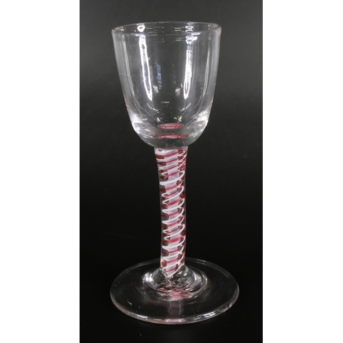 851 - An 18th Century continental colour twist glass and two 19th Century red double twist glasses