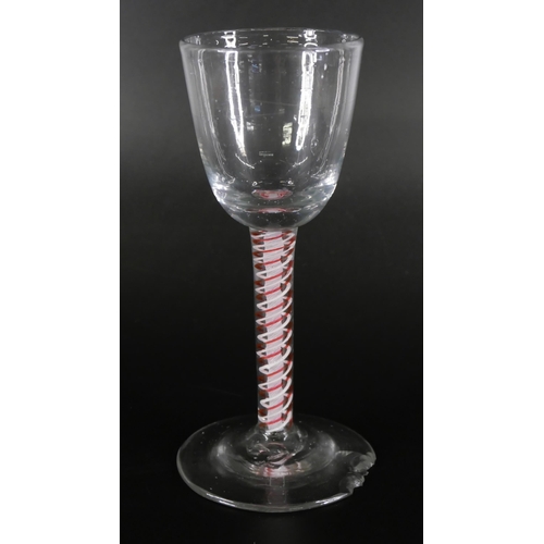 851 - An 18th Century continental colour twist glass and two 19th Century red double twist glasses