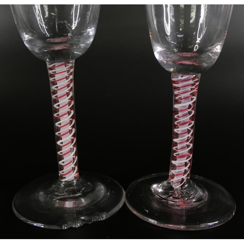 851 - An 18th Century continental colour twist glass and two 19th Century red double twist glasses