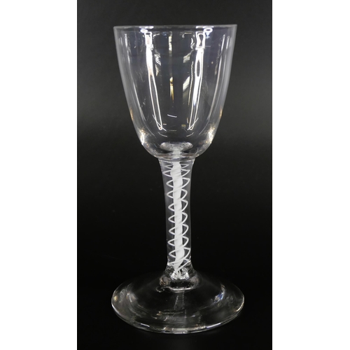 853 - Three 18th Century wine glasses with double series opaque twists