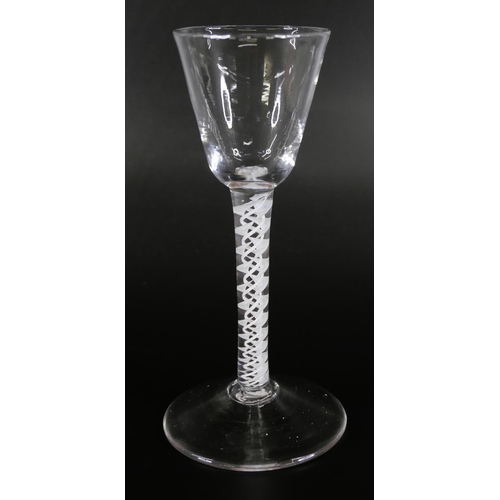 853 - Three 18th Century wine glasses with double series opaque twists