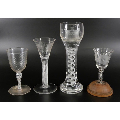 854 - Two Jacobite wine glasses, circa 1900, a double series opaque twist cordial glass with finely engrav... 