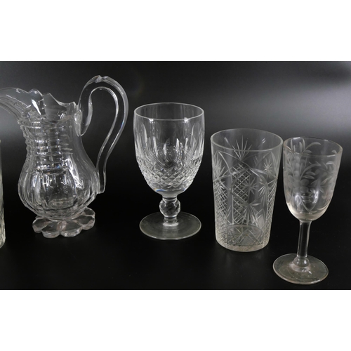 859 - Four boxes of crystal and glass including drinking glasses, decanters, jugs, some a/f