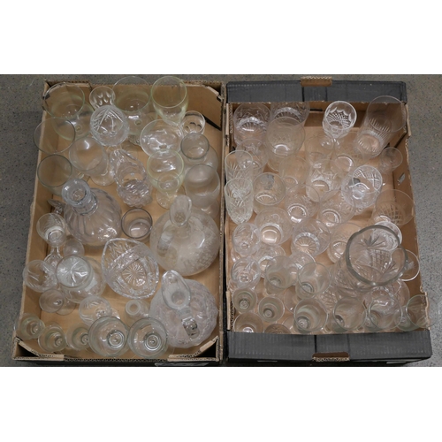 859 - Four boxes of crystal and glass including drinking glasses, decanters, jugs, some a/f