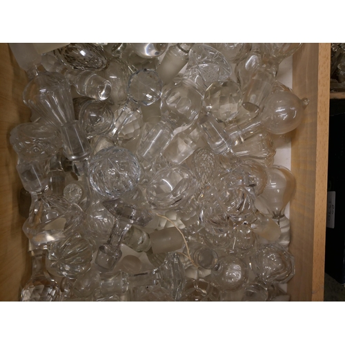 862 - A large collection of glass stoppers