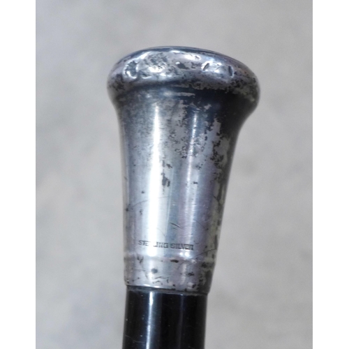 872 - A silver topped hallmarked walking cane