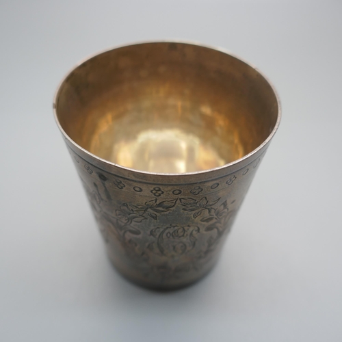 896 - A Georgian white metal beaker, with two continental control marks, tests as silver, 77.8g, 74mm