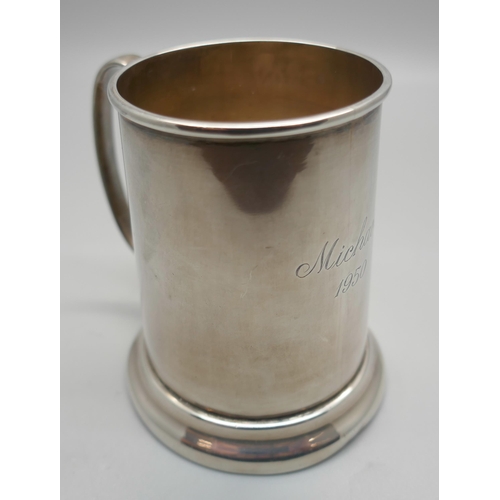 898 - A silver mug, 83g, 'Michael 1950'