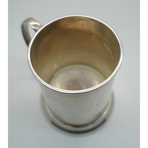 898 - A silver mug, 83g, 'Michael 1950'