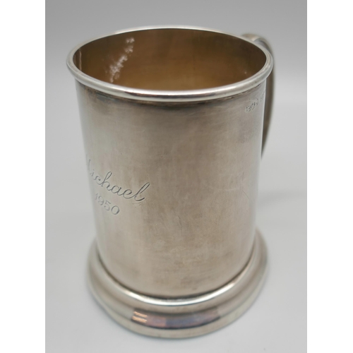 898 - A silver mug, 83g, 'Michael 1950'