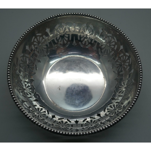 911 - A pierced silver dish, Walker & Hall, 42g, diameter 10cm