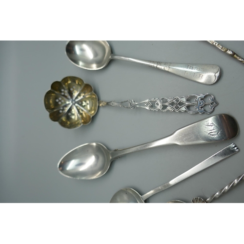 915 - A collection of silver spoons including a sifter spoon, 155g