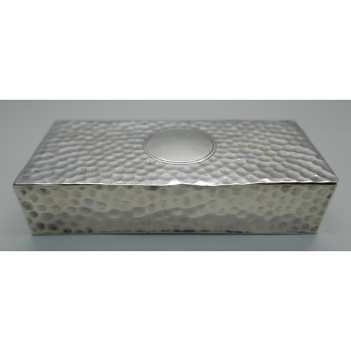 921 - An Arts and Crafts hammered silver box, William Comyns, London 1905, 76g, 102mm wide