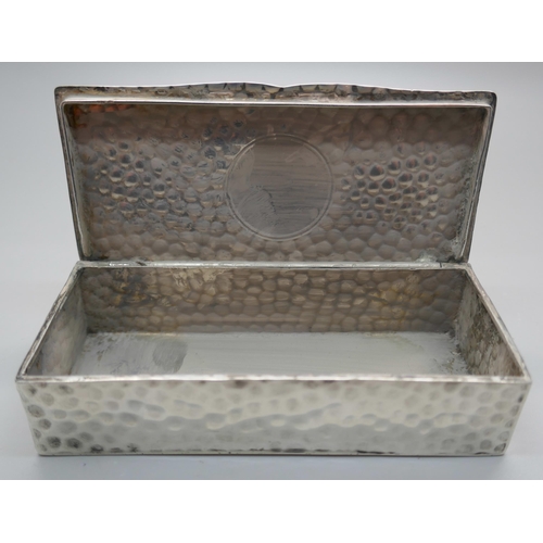 921 - An Arts and Crafts hammered silver box, William Comyns, London 1905, 76g, 102mm wide