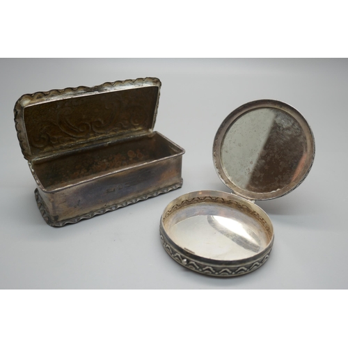 922 - A silver box, 50g, and a white metal compact with mirror, (tests as silver)