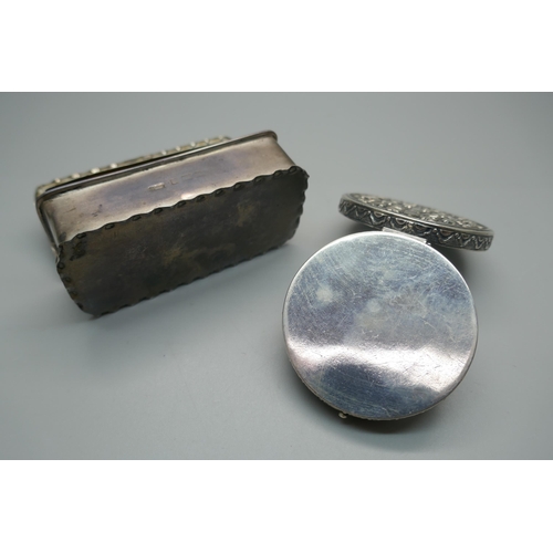 922 - A silver box, 50g, and a white metal compact with mirror, (tests as silver)