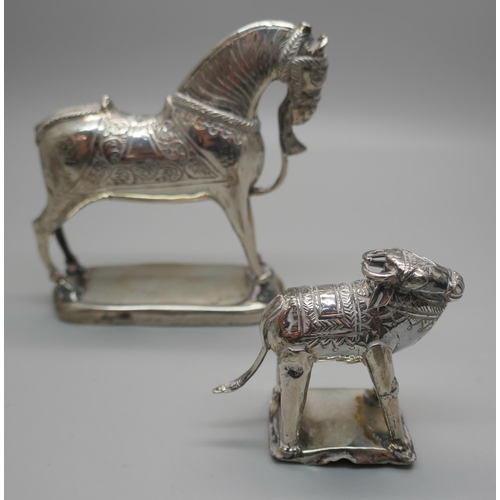 924 - Two Eastern white metal model animals, horse and water buffalo, both test as silver, 194g