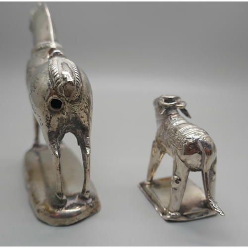 924 - Two Eastern white metal model animals, horse and water buffalo, both test as silver, 194g