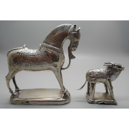 924 - Two Eastern white metal model animals, horse and water buffalo, both test as silver, 194g