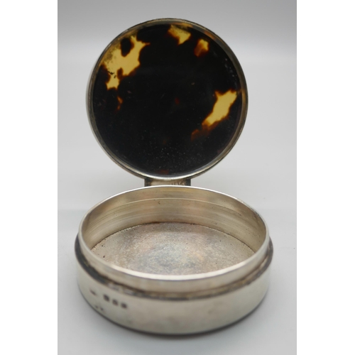 925 - A circular silver and tortoiseshell box, London 1918, 55mm diameter