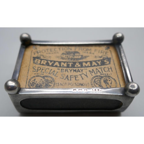 927 - A Victorian silver embossed matchbox holder, Birmingham 1900