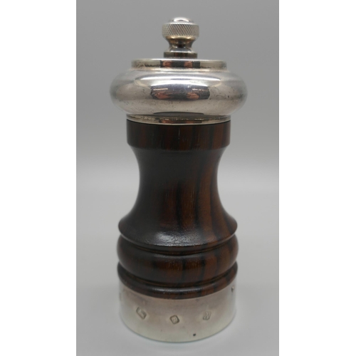 930 - A silver mounted turned wood pepper grinder, Mappin & Webb