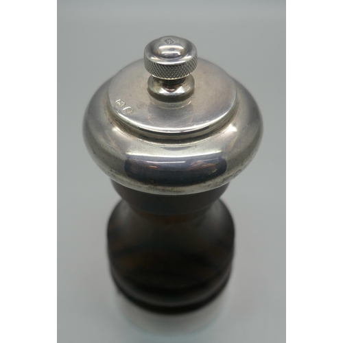 930 - A silver mounted turned wood pepper grinder, Mappin & Webb