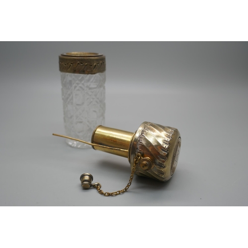 931 - A cut glass atomiser with gilt metal top, scratched initial 'M'