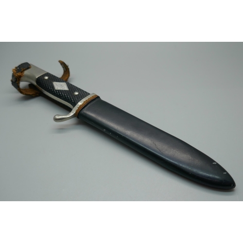 951 - A German dagger with scabbard, dagger 243mm