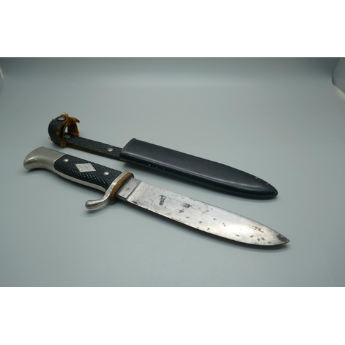 951 - A German dagger with scabbard, dagger 243mm