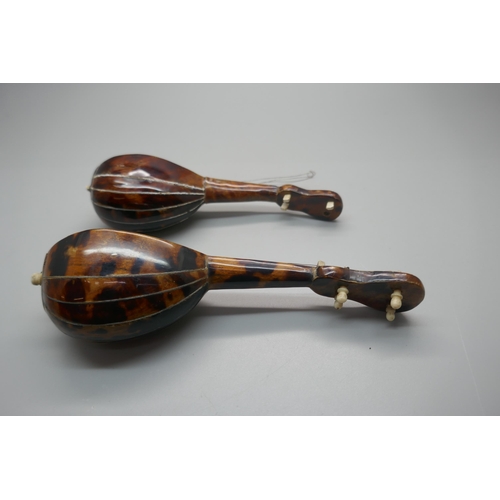 952 - Two miniature mandolins, with tortoiseshell and mother of pearl