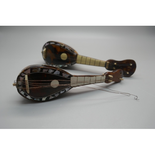 952 - Two miniature mandolins, with tortoiseshell and mother of pearl